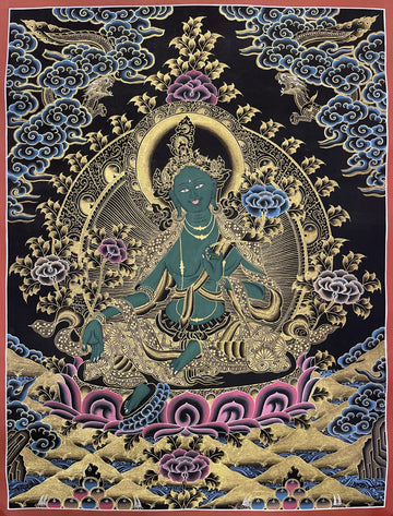 Green Tara thangka, 51×66 cm: Green Tara in gold-coloured line work on black, with dragons in blue clouds above
