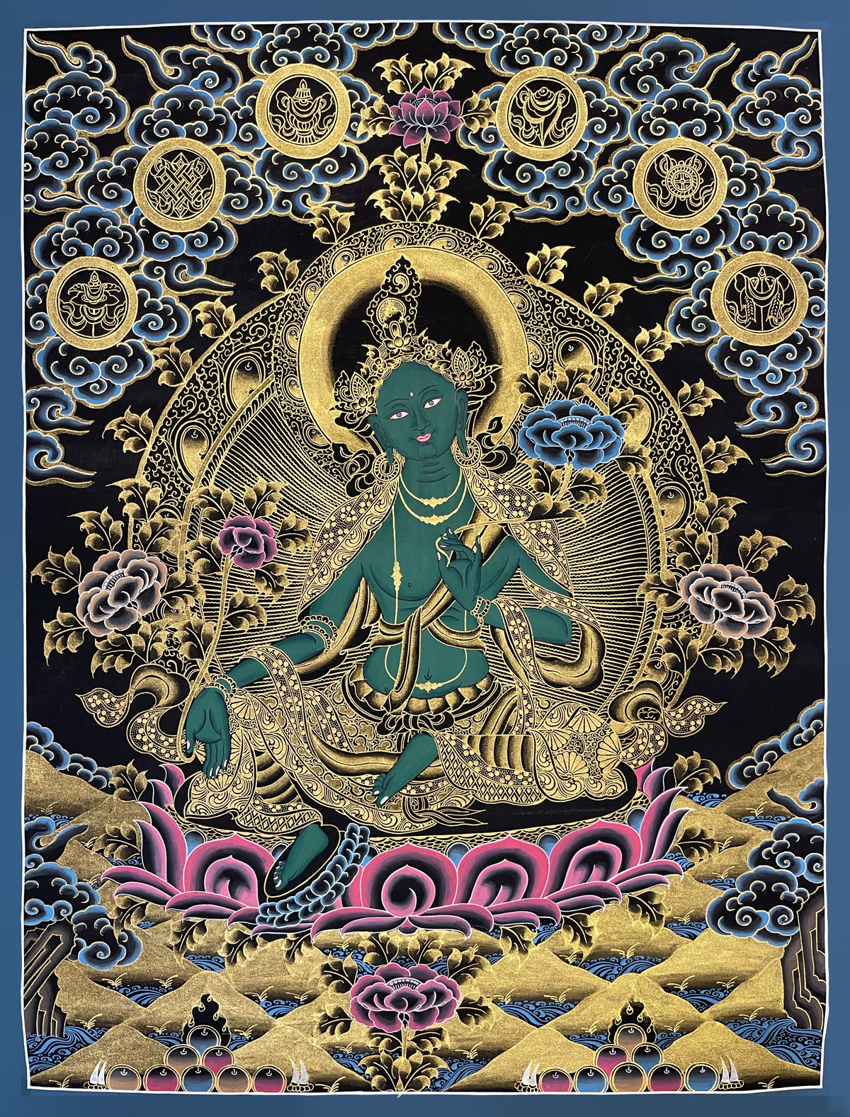 Green Tara thangka, 52×67 cm: Green Tara in black and gold on a pink lotus, with auspicious symbols in roundels above