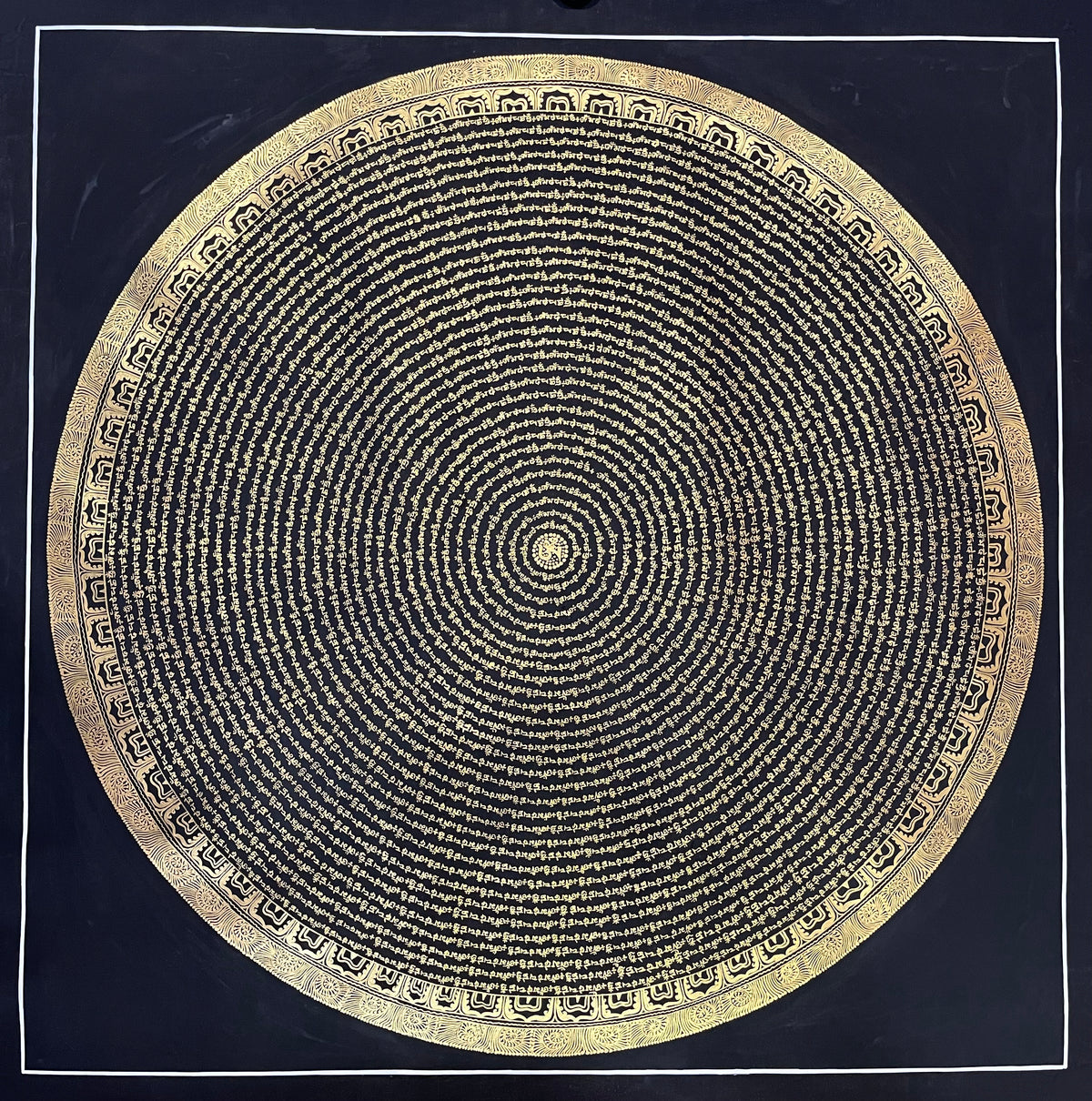 Mantra Mandala thangka, 107×107 cm: concentric rings of gold-coloured Tibetan script on a black ground