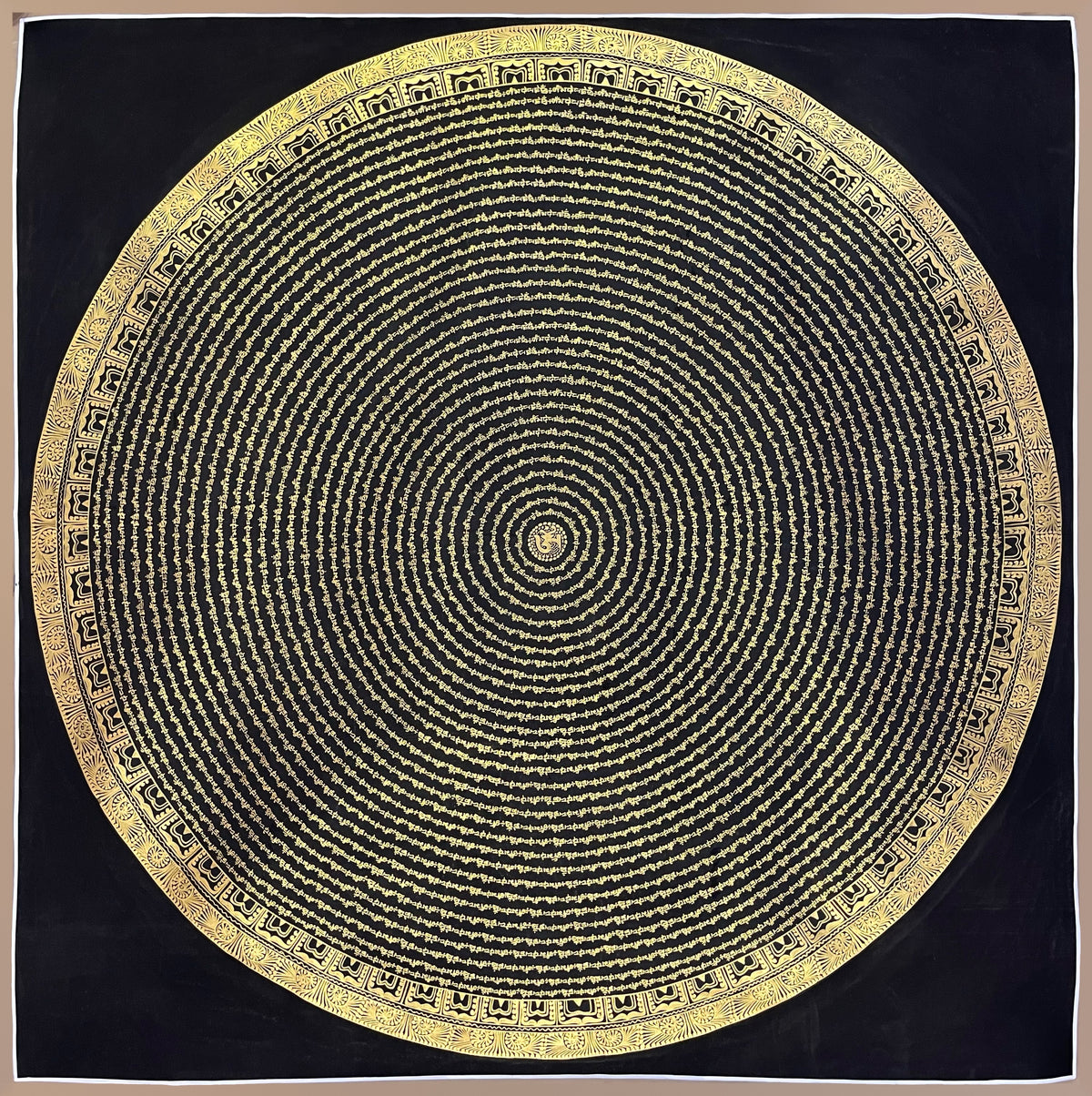 Mantra Mandala thangka, 107×107 cm: concentric rings of gold-coloured Om Mani Padme Hum script on black around a central Om
