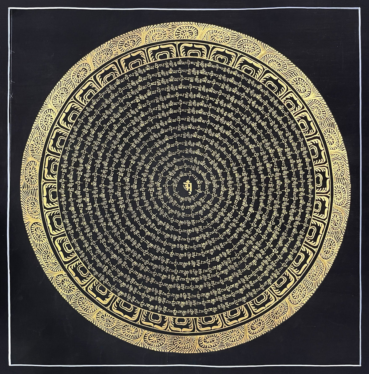 Mantra Mandala thangka, 107×107 cm: rings of gold-coloured mantra script on black around a single syllable