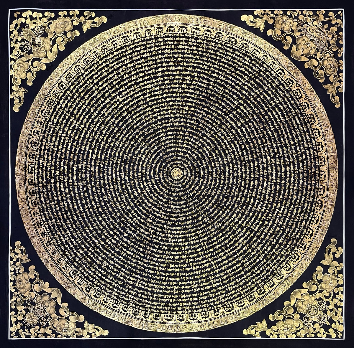 Mantra Mandala thangka, 107×107 cm: concentric rings of gold-coloured mantra script on black, with gold-coloured peonies in the corners