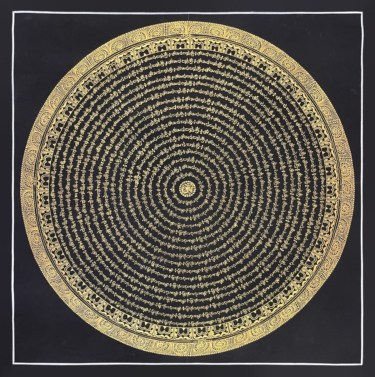 Mantra Mandala thangka, 75×75 cm: rings of gold-coloured Om Mani Padme Hum script around a central Om, on black