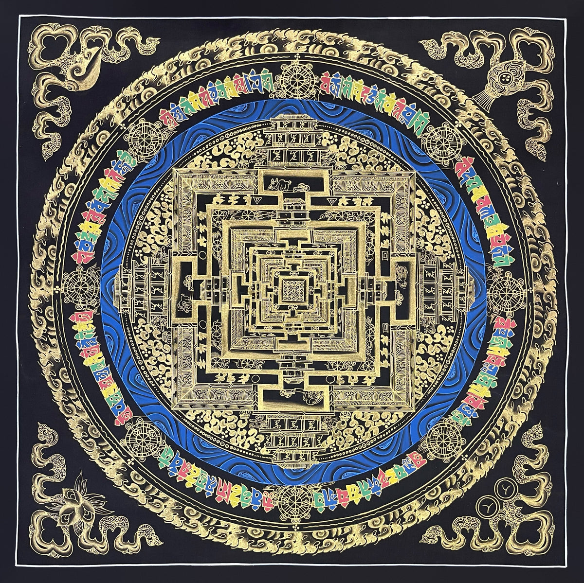 Kalachakra Mandala thangka, 56×56 cm: Kalachakra palace mandala in gold-coloured line work on black, with a blue ring of water and multicoloured syllables