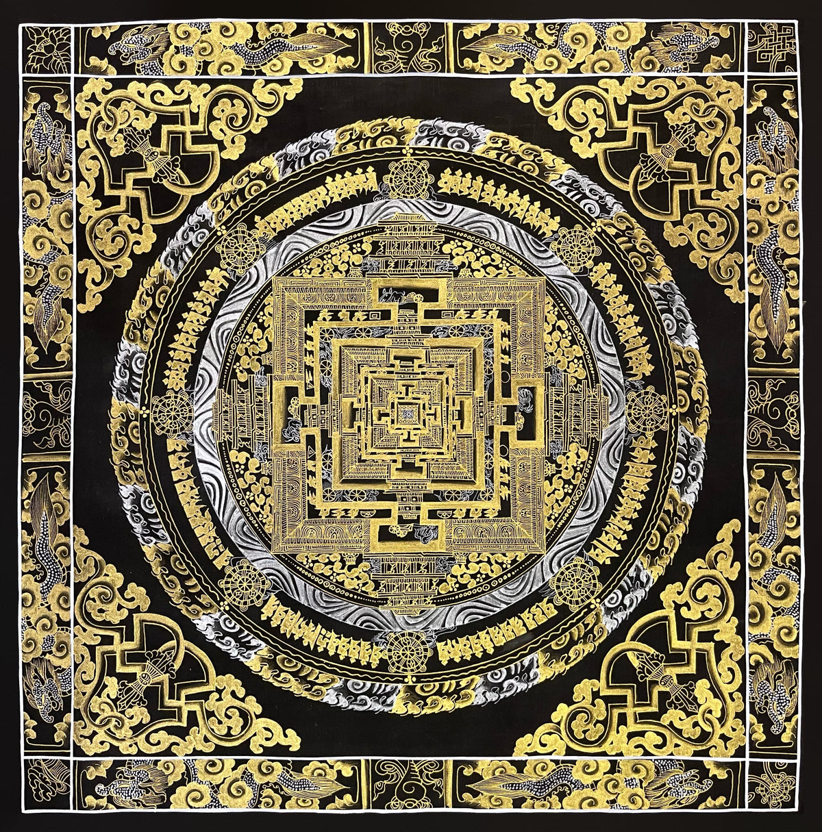 Kalachakra Mandala thangka, 56×56 cm: Kalachakra palace mandala in gold-coloured and silver-coloured line work on black, inside a border of dragons