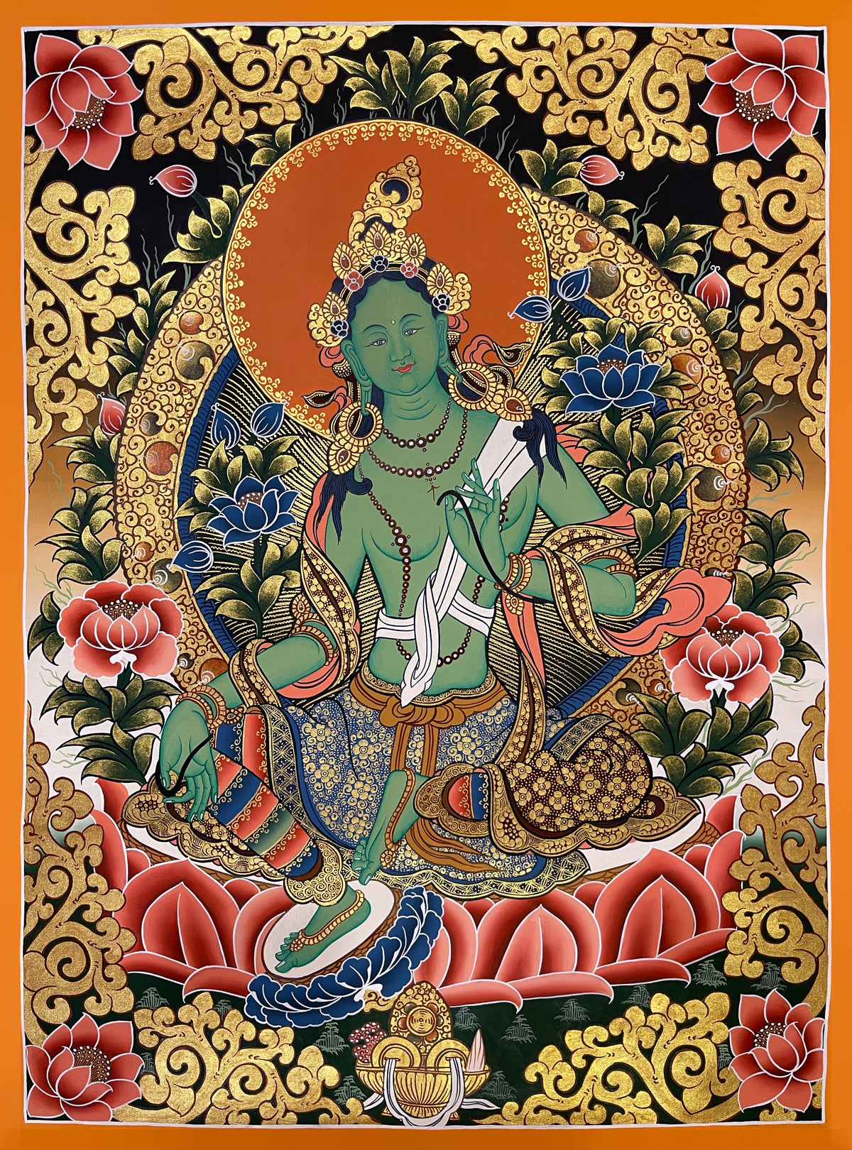 Green Tara thangka, 51×67 cm: Green Tara on a red lotus among blue lotuses, on black with gold-coloured scrollwork