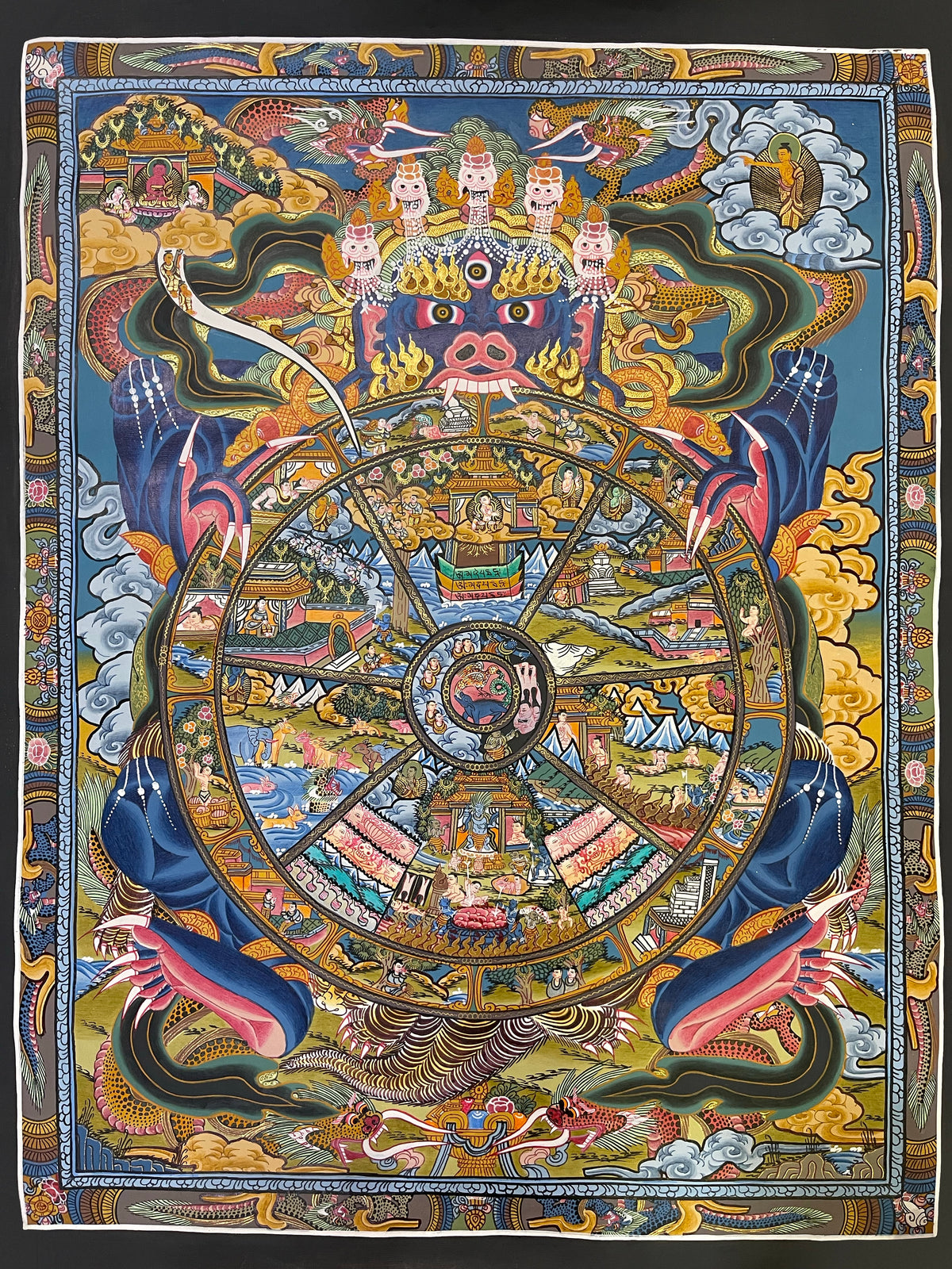Wheel of Life thangka, 52×66 cm: blue Yama holding the Wheel of Life amid dragons and smoke