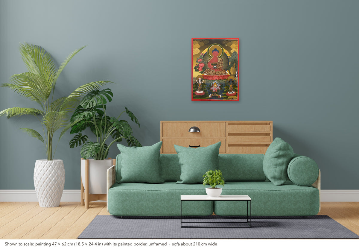 Amitabha Buddha thangka shown to scale in a living room, unframed, above a sofa about 210 cm wide (47×62 cm)