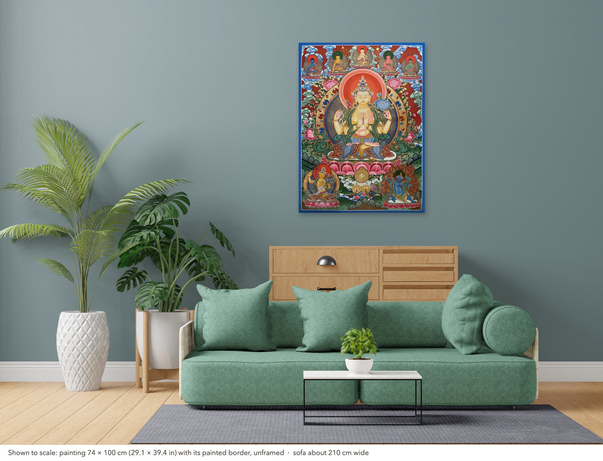 Chenrezig thangka shown to scale in a living room, unframed, above a sofa about 210 cm wide (74×100 cm)