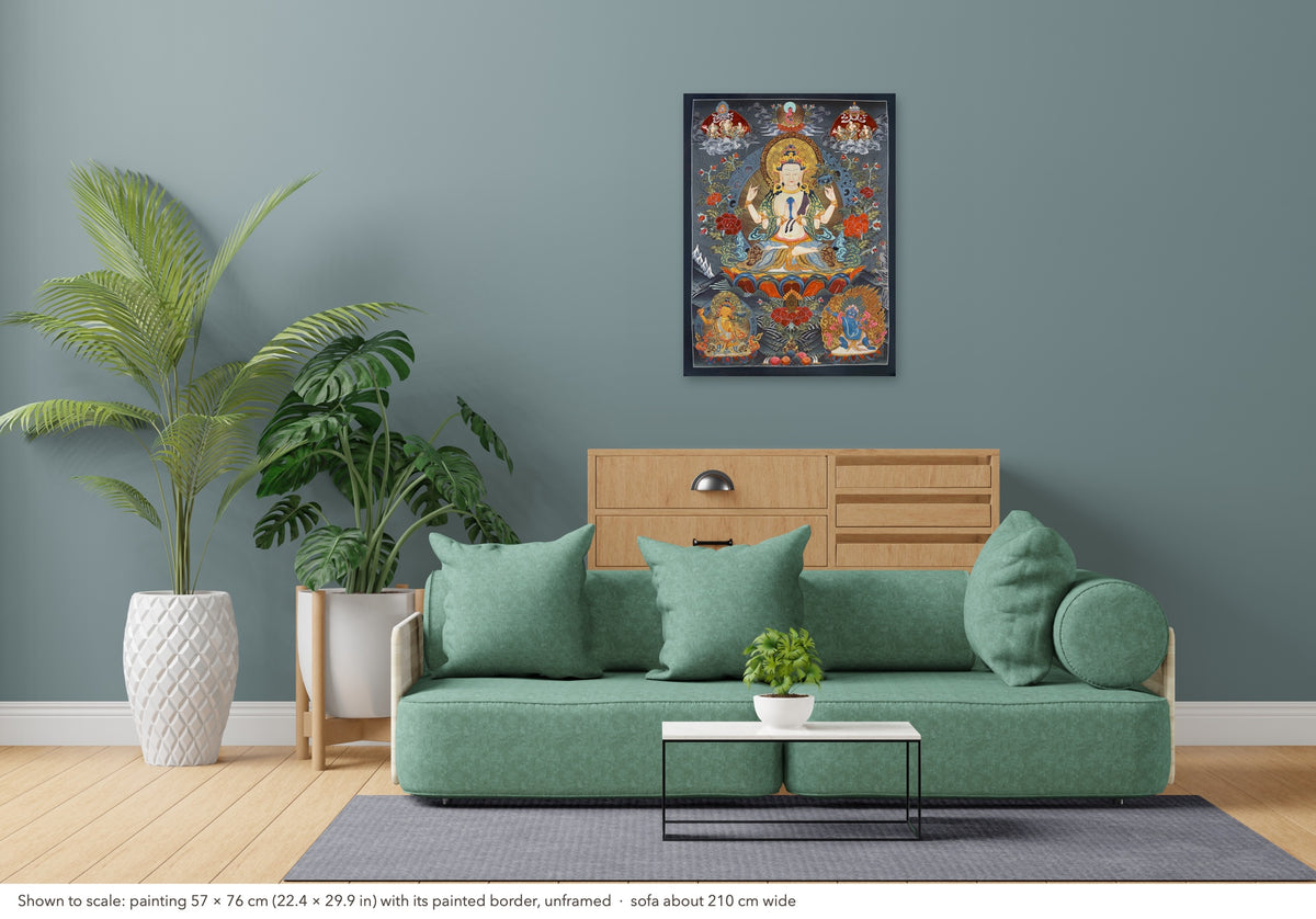 Chenrezig thangka shown to scale in a living room, unframed, above a sofa about 210 cm wide (57×76 cm)