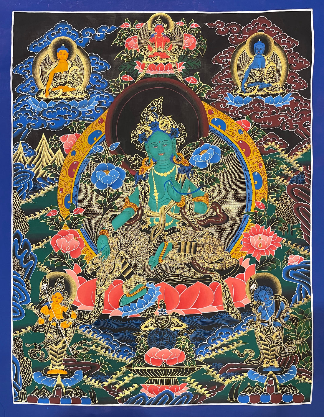 Green Tara thangka, 56×70 cm: Green Tara with three Buddhas above and two standing bodhisattvas below, on black