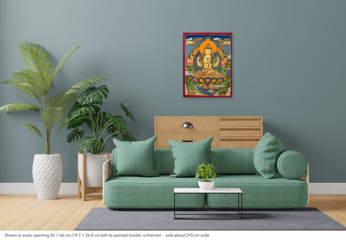 Chenrezig thangka shown to scale in a living room, unframed, above a sofa about 210 cm wide (50×66 cm)