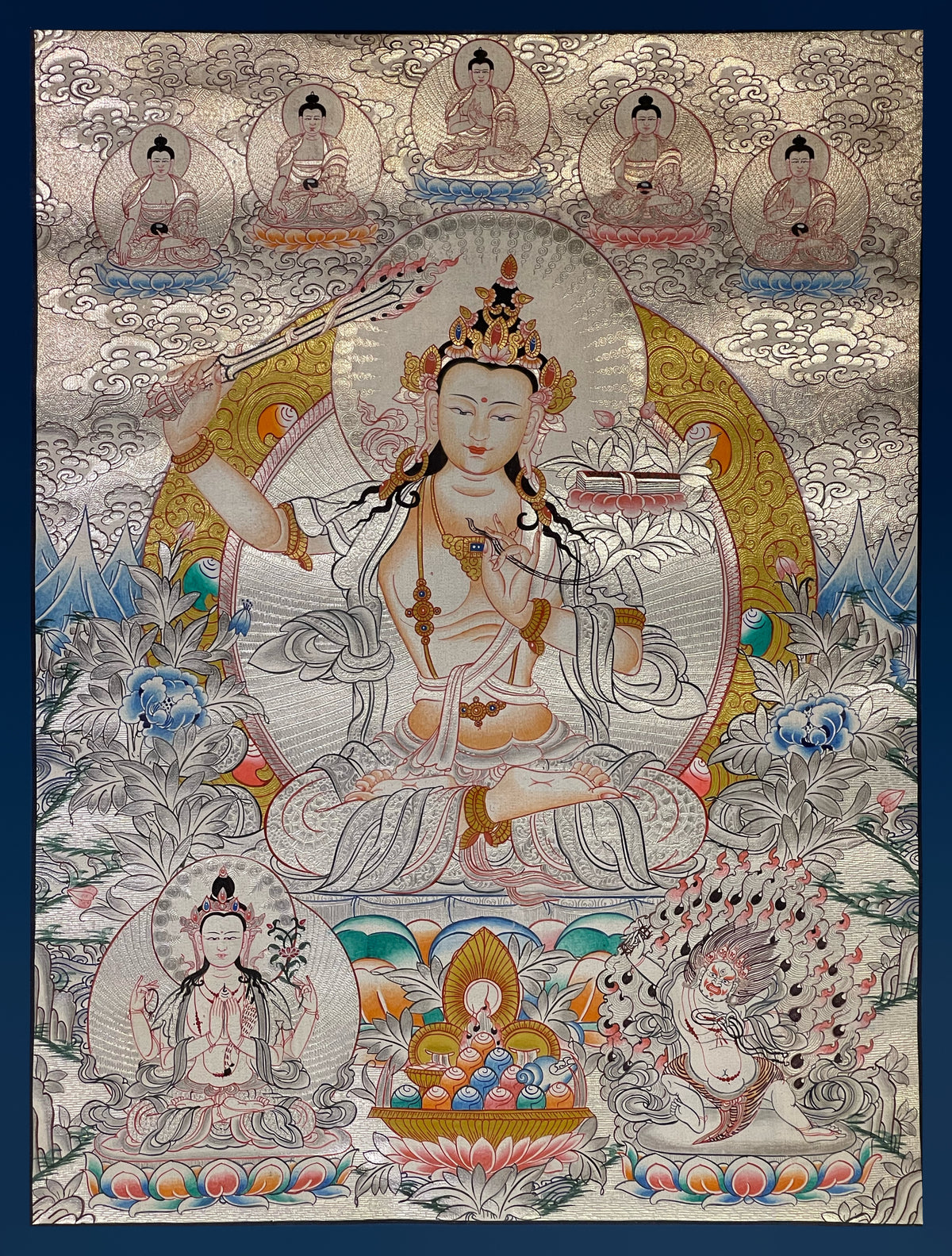 Manjushri thangka, 38×49 cm: Manjushri raising his sword in a pale silver-coloured palette, with the five Buddhas above