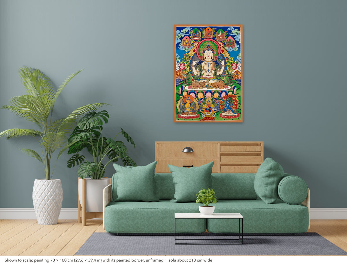 Chenrezig thangka shown to scale in a living room, unframed, above a sofa about 210 cm wide (70×100 cm)