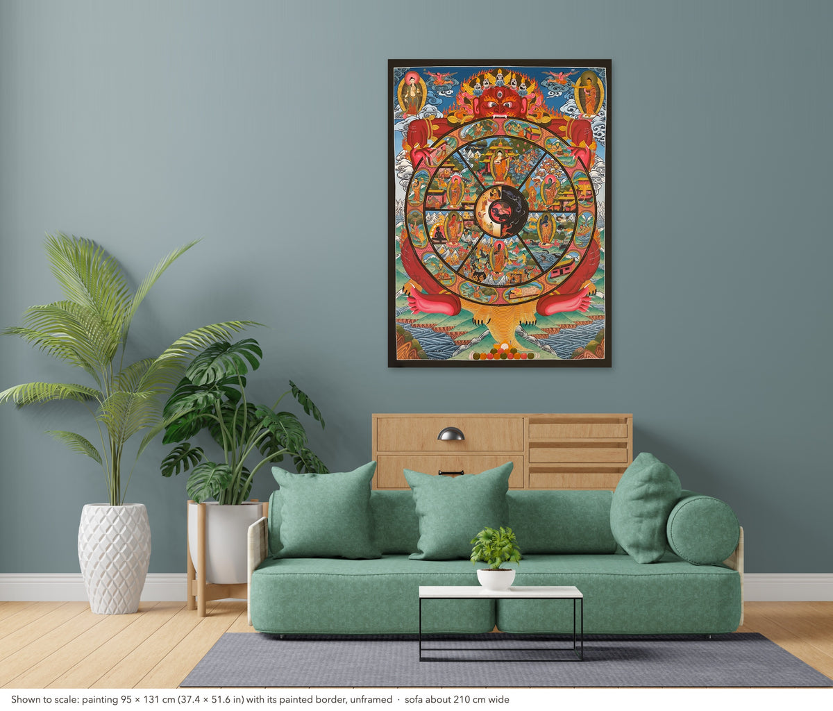 Wheel of Life thangka shown to scale in a living room, unframed, above a sofa about 210 cm wide (95×131 cm)