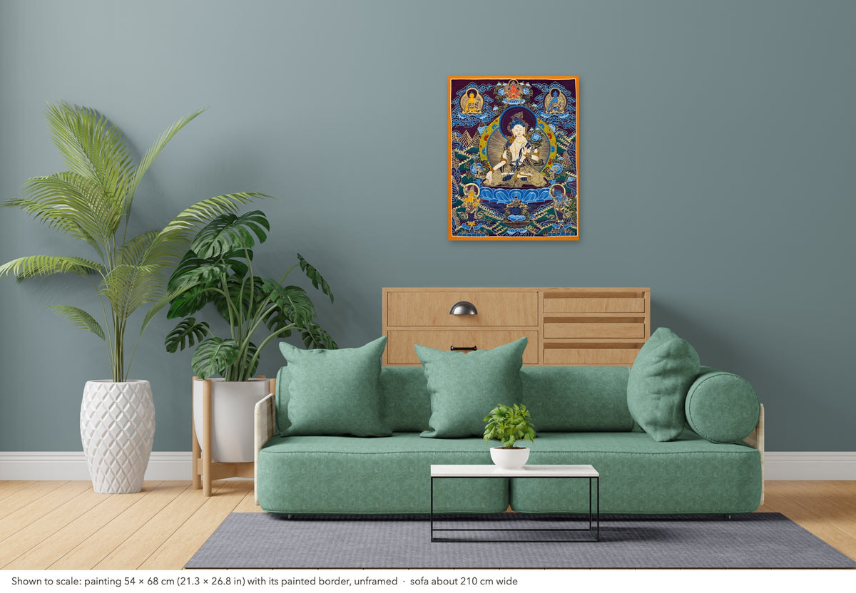 White Tara thangka shown to scale in a living room, unframed, above a sofa about 210 cm wide (54×68 cm)