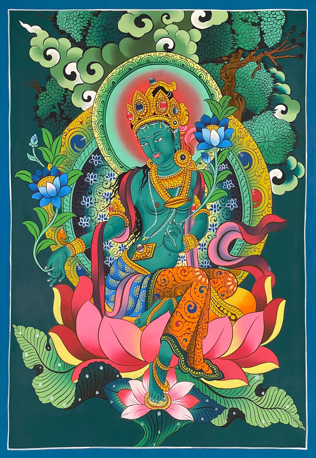 Green Tara thangka, 57×80 cm: Newar-style Green Tara on a large pink lotus under a spreading tree, on dark teal