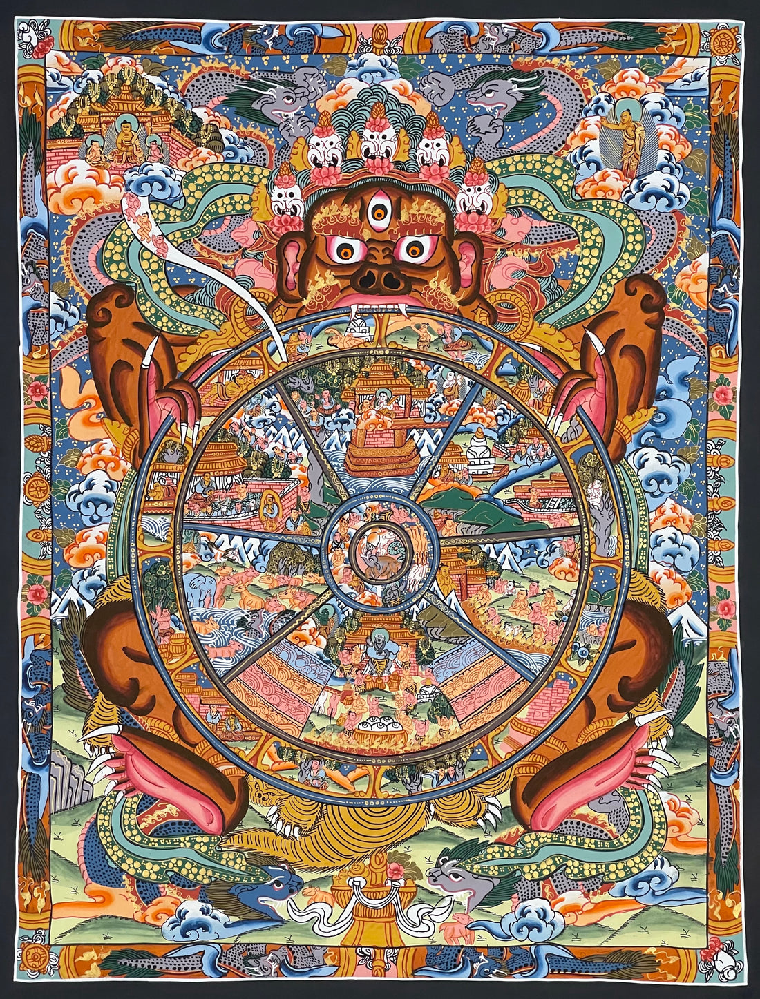 Wheel of Life thangka, 43×53 cm: brown Yama holding a densely painted Wheel of Life, inside a border of dragons