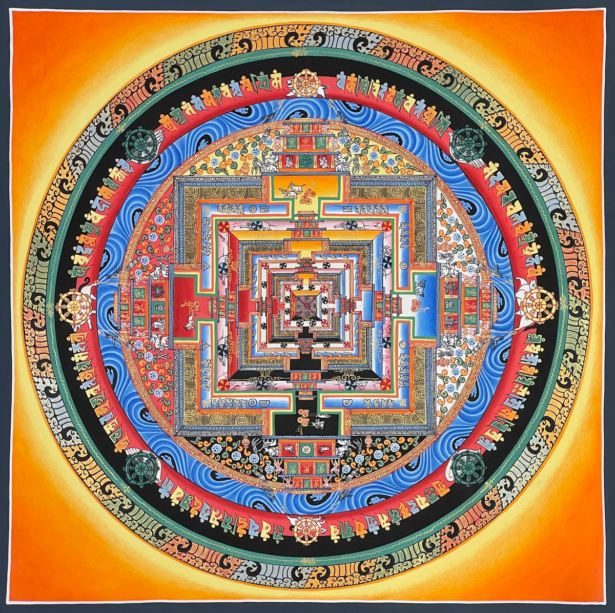 Kalachakra Mandala thangka, 55×55 cm: Kalachakra palace mandala with rings of mantra syllables and dharma wheels on an orange ground glowing yellow around the circle