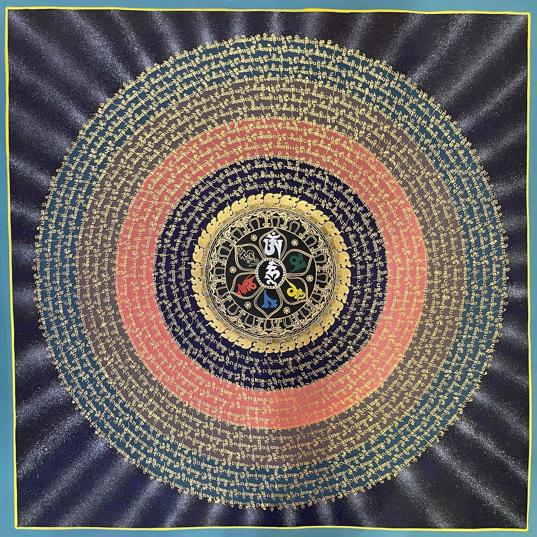 Mantra Mandala thangka, 75×75 cm: rings of gold-coloured mantra script on bands of navy, teal and coral around a six-syllable lotus