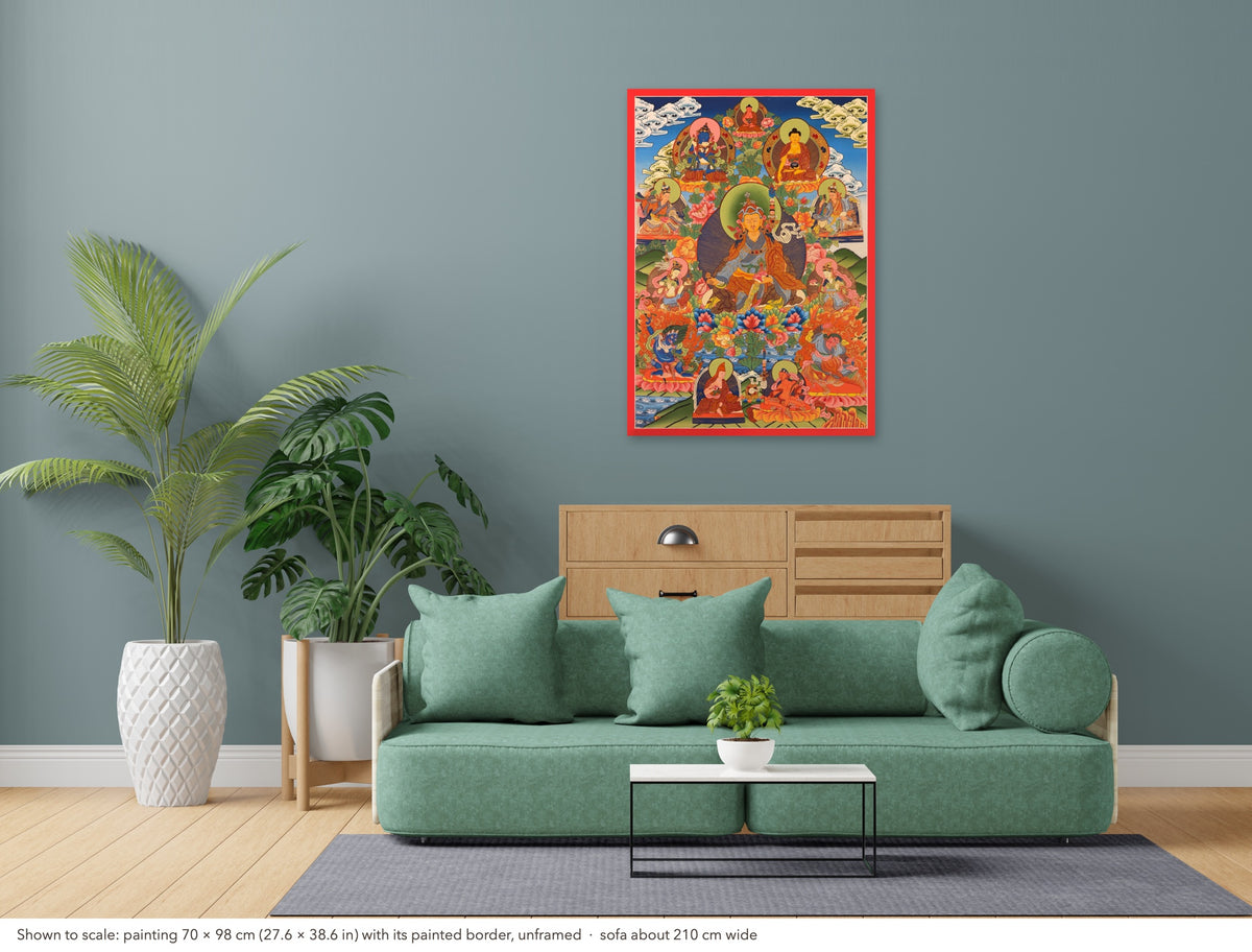 Padmasambhava thangka shown to scale in a living room, unframed, above a sofa about 210 cm wide (70×98 cm)