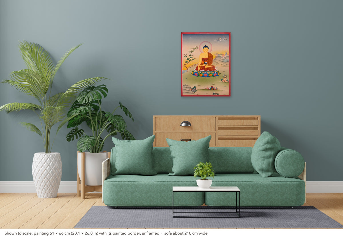 Shakyamuni Buddha thangka shown to scale in a living room, unframed, above a sofa about 210 cm wide (51×66 cm)