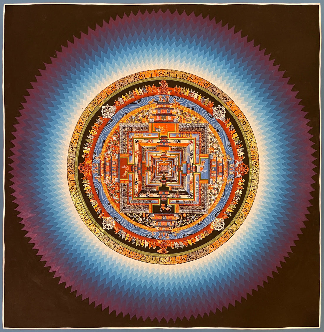 Kalachakra Mandala thangka, 55×55 cm: Kalachakra palace mandala surrounded by zigzag rays shading from white to violet