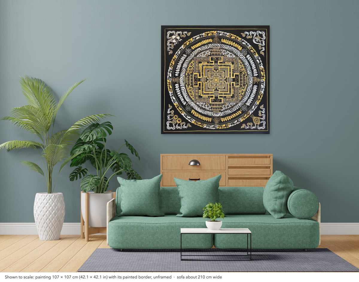 Kalachakra Mandala thangka shown to scale in a living room, unframed, above a sofa about 210 cm wide (107×107 cm)