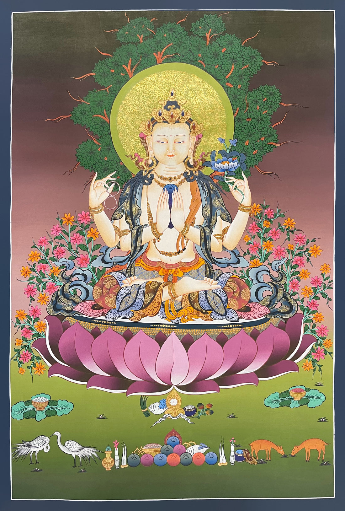 Chenrezig thangka, 59×85 cm: four-armed Chenrezig on a large pink lotus under a tree, with cranes, deer and offerings below