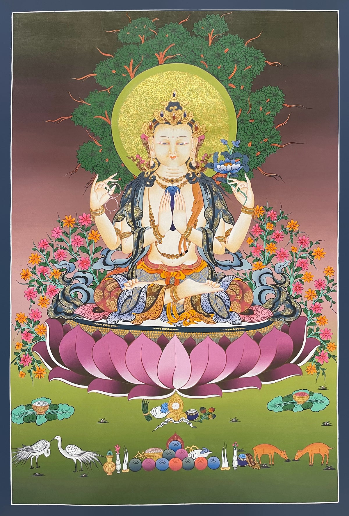 Chenrezig thangka, 59×85 cm: four-armed Chenrezig on a large pink lotus under a tree, with cranes, deer and offerings below