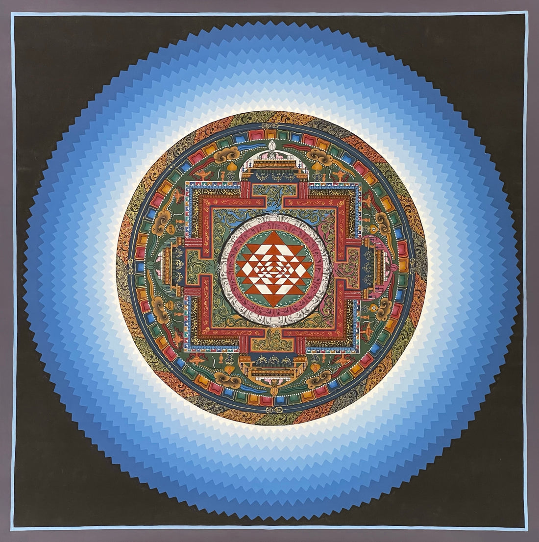 Sri Yantra Mandala thangka, 45×45 cm: the Sri Yantra inside a palace mandala, surrounded by stepped blue rays on black