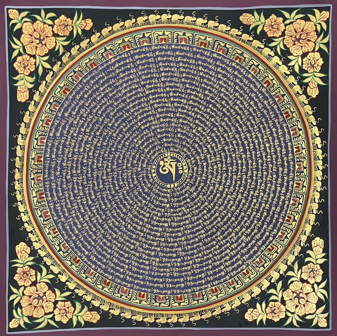 Mantra Mandala thangka, 55×55 cm: concentric rings of gold-coloured mantra script on deep blue around Om