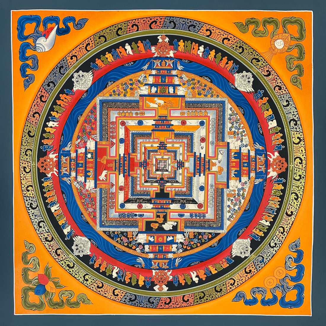 Kalachakra Mandala thangka, 55×55 cm: Kalachakra palace mandala with rings of mantra syllables and dharma wheels on a saffron ground