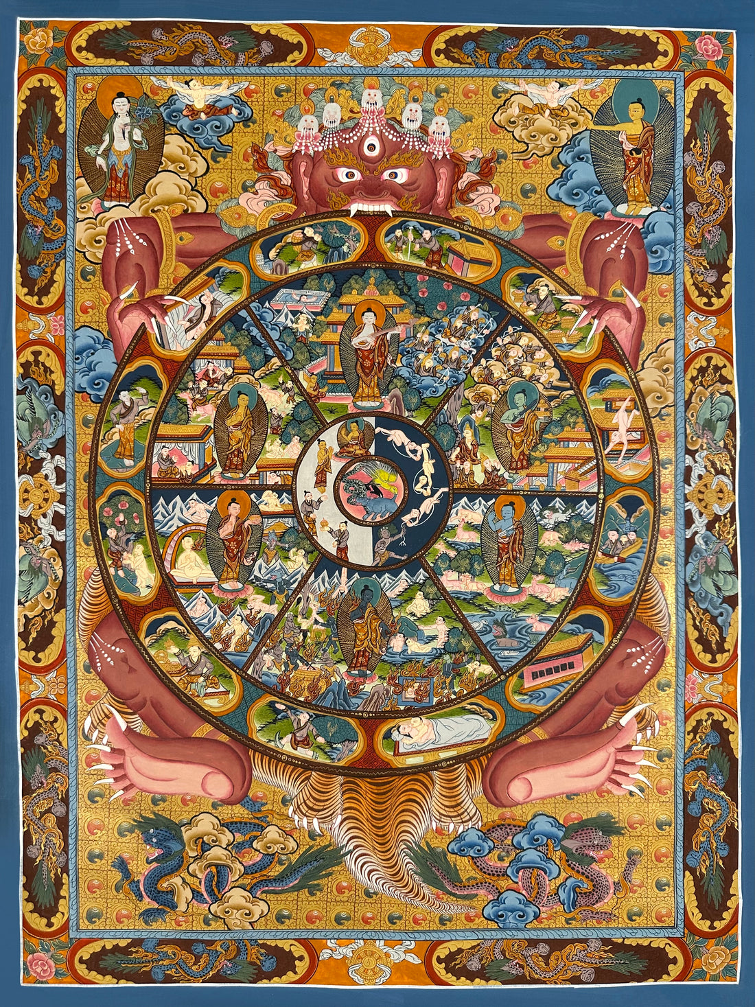 Wheel of Life thangka, 40×61 cm: red Yama holding the Wheel of Life on a gold-coloured ground, framed by a border of dragons