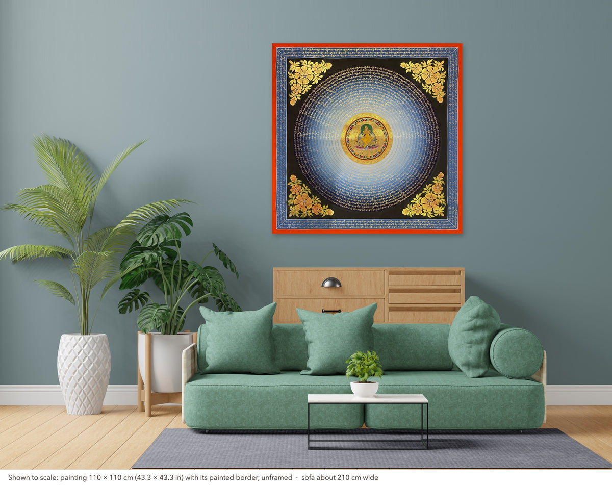 Jambhala Mantra Mandala thangka shown to scale in a living room, unframed, above a sofa about 210 cm wide (110×110 cm)