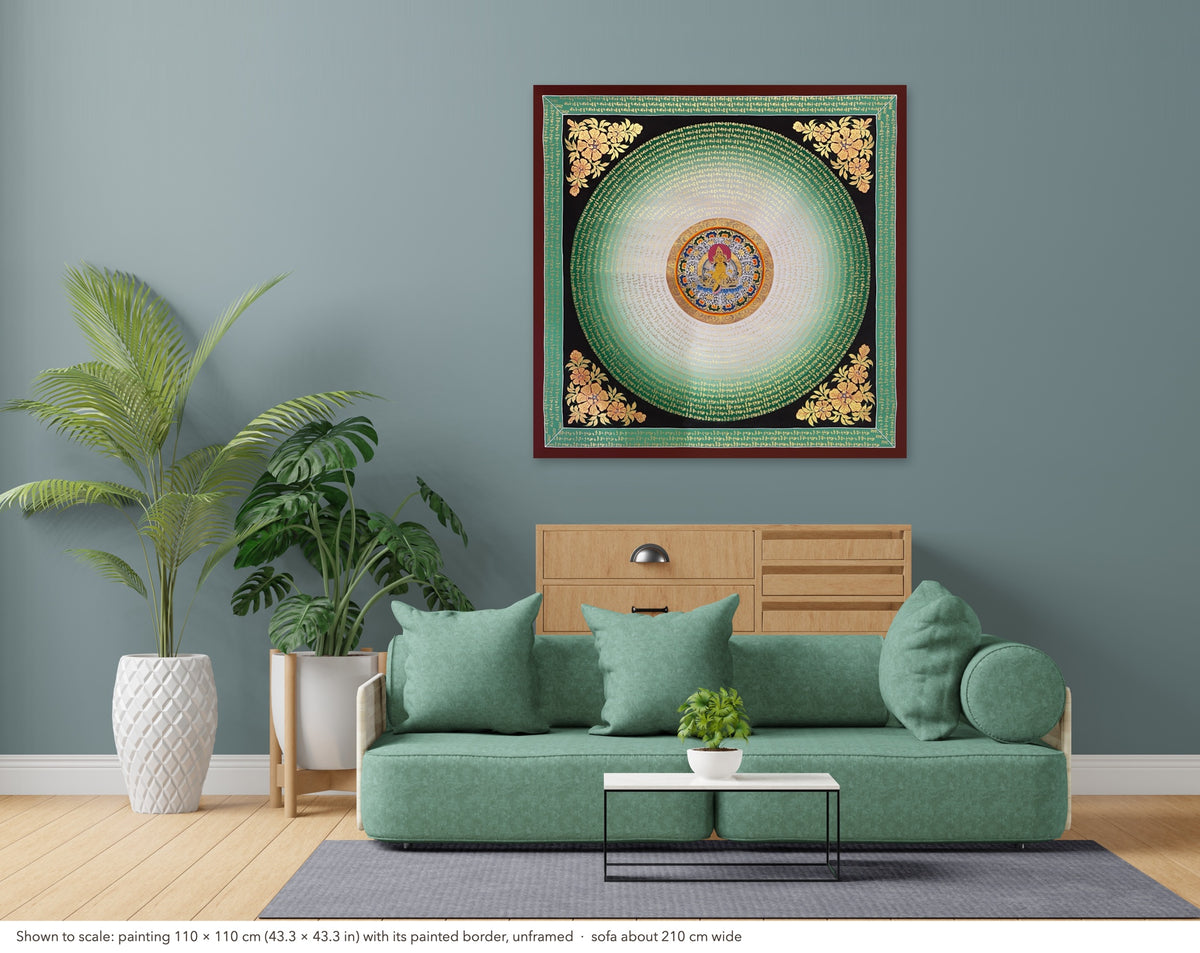 Jambhala Mantra Mandala thangka shown to scale in a living room, unframed, above a sofa about 210 cm wide (110×110 cm)