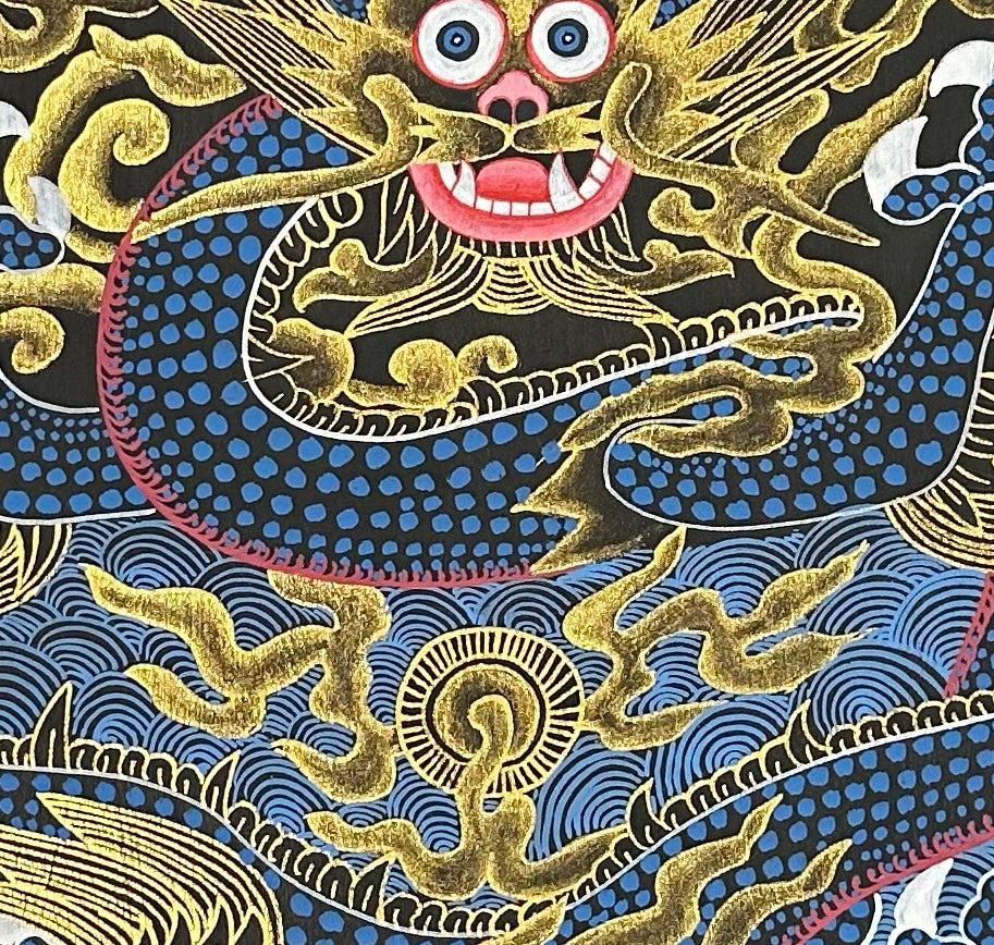 Dragon Mandala thangka, 55×55 cm: a blue dragon reaching for a flaming pearl in gold-coloured clouds, inside a key-pattern circle on black
