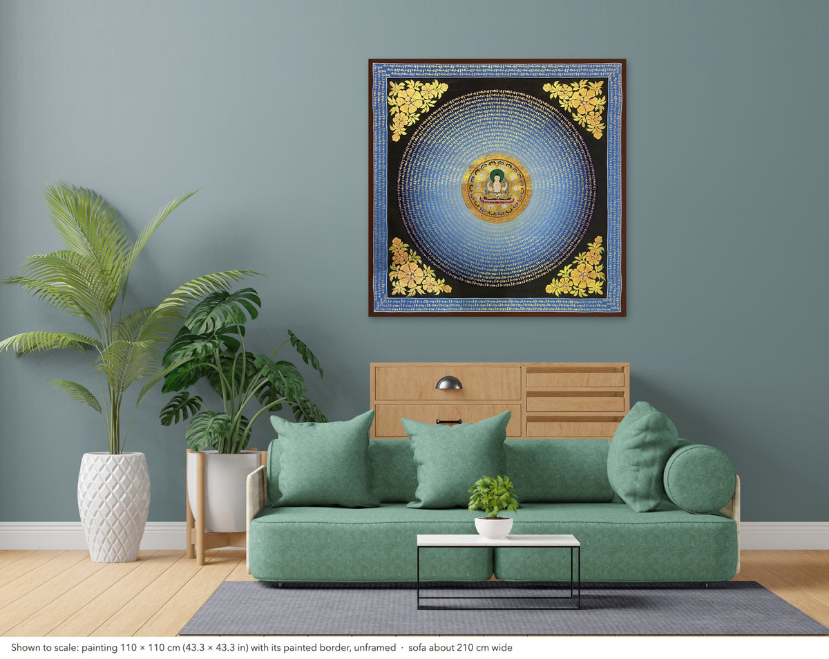 Chenrezig Mantra Mandala thangka shown to scale in a living room, unframed, above a sofa about 210 cm wide (110×110 cm)