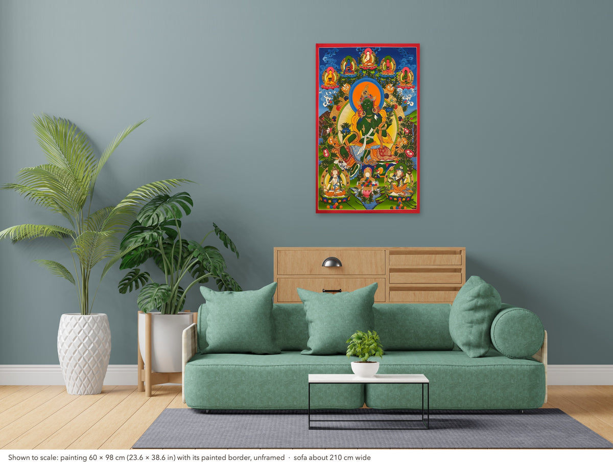 Green Tara thangka shown to scale in a living room, unframed, above a sofa about 210 cm wide (60×98 cm)