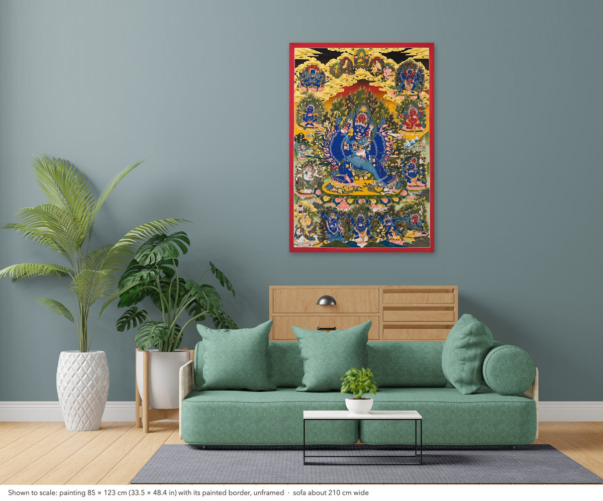 Yamantaka with Consort thangka shown to scale in a living room, unframed, above a sofa about 210 cm wide (85×123 cm)