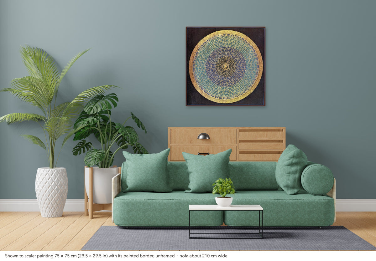 Mantra Mandala thangka shown to scale in a living room, unframed, above a sofa about 210 cm wide (75×75 cm)