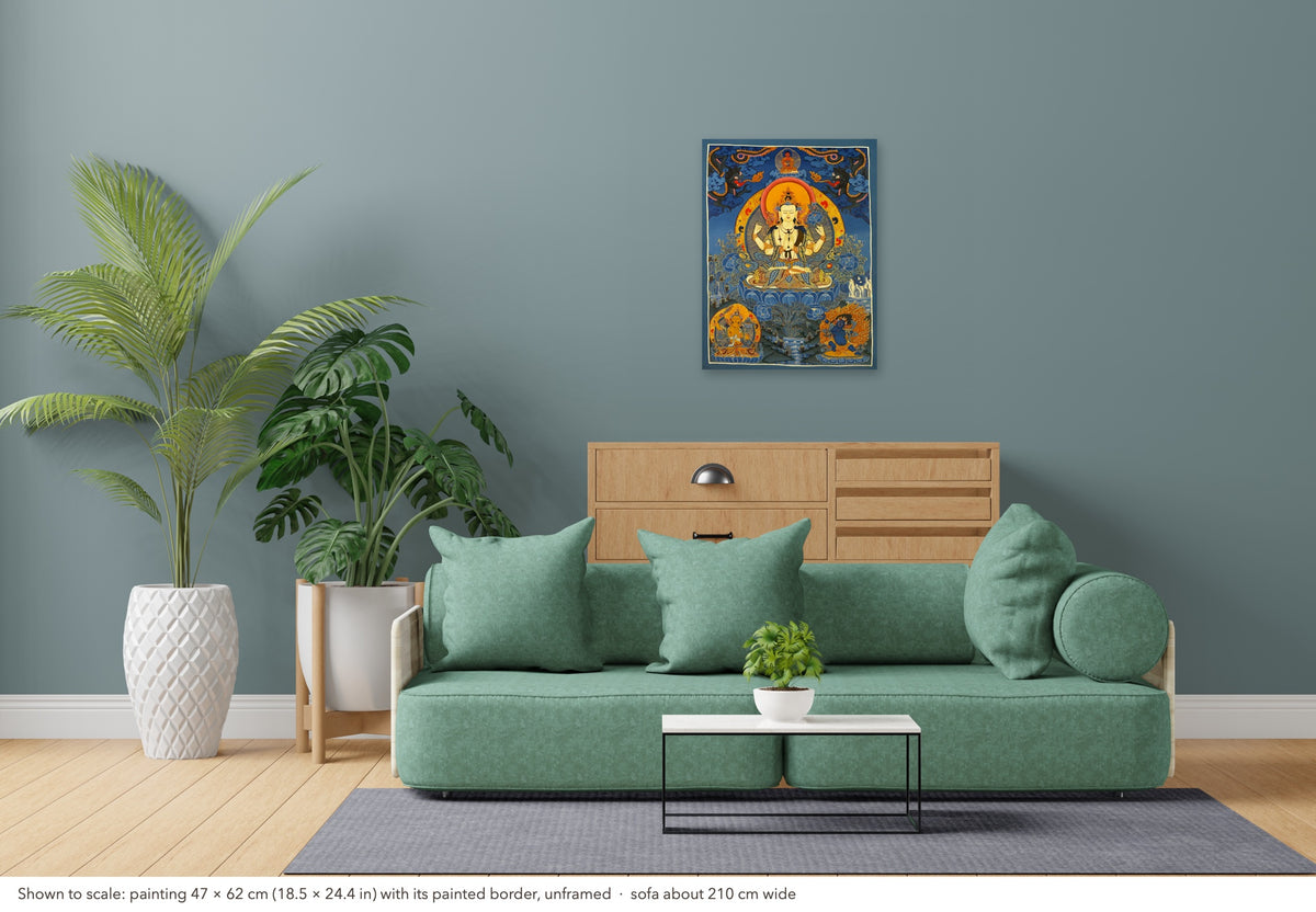 Chenrezig thangka shown to scale in a living room, unframed, above a sofa about 210 cm wide (47×62 cm)